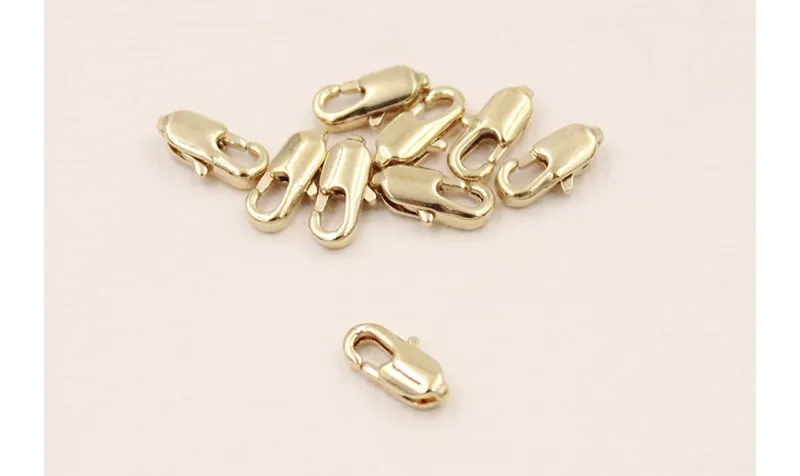 Mosquetón 10*4mm longitud Baño Oro 18K y 3 micras Mosquetón 10*4mm longitud Baño Oro 18K y 3 micras