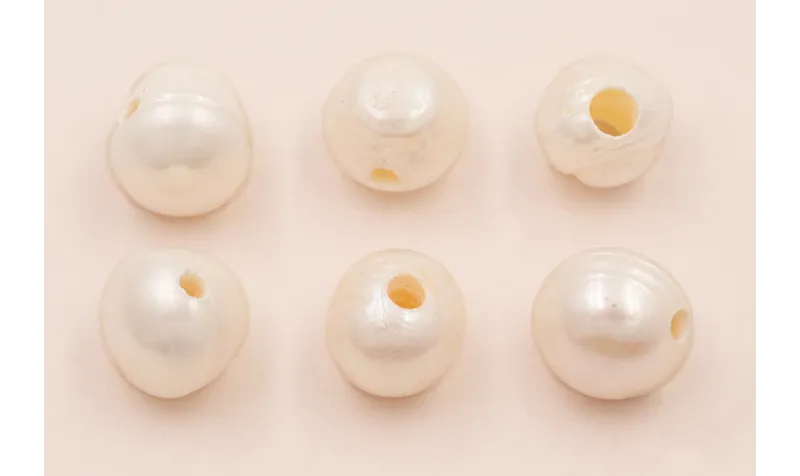 Perla de  11-12mm con agujero de 3mm