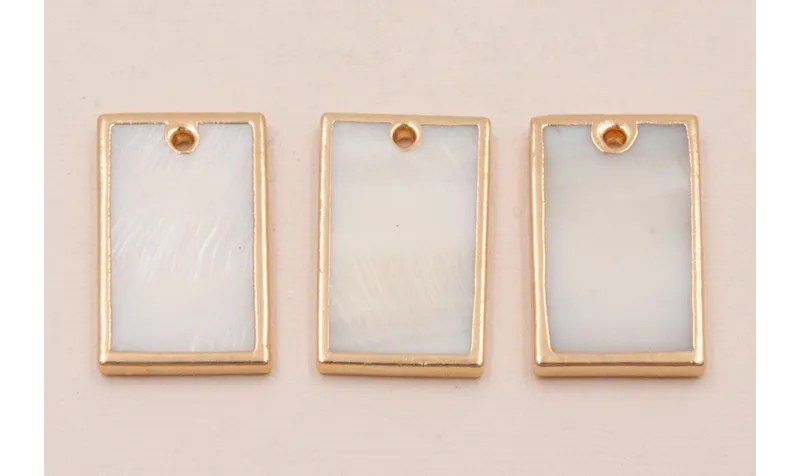 Rectanguo Chapa Nacar 24*18*2mm bordes dorados /Cuentas de  Nacar 