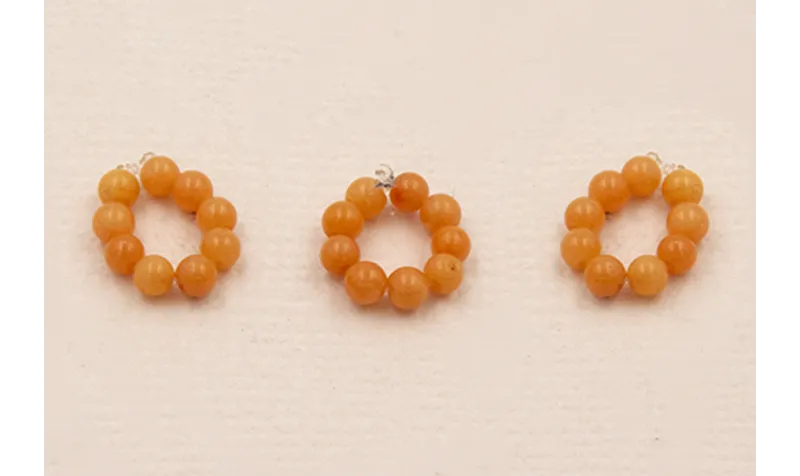 aro de 9 Bolas de Coral Naranja de 2mm.  CSP537-1