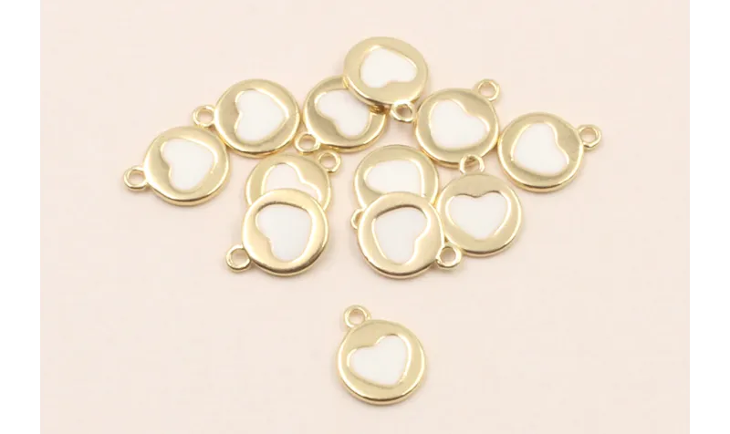 Chapita corazon Blanco 7mm  / Cuentas Metálicas de Latón / Zamak