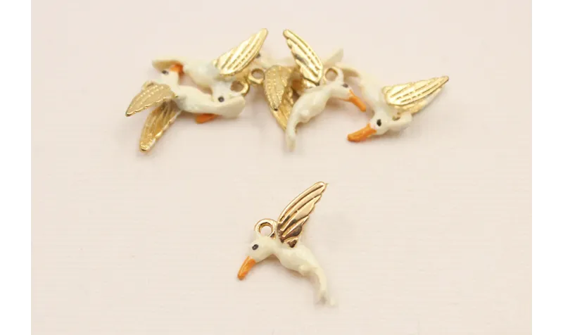 Cuenta Colibri 15*19mm esmalte Blanco pico naranja