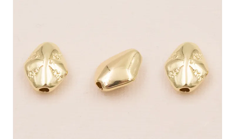 Cuenta Pepita transversal 13*10*4mm Oro