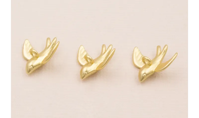 Colgante golondrina 14*14mm Dorado Mate