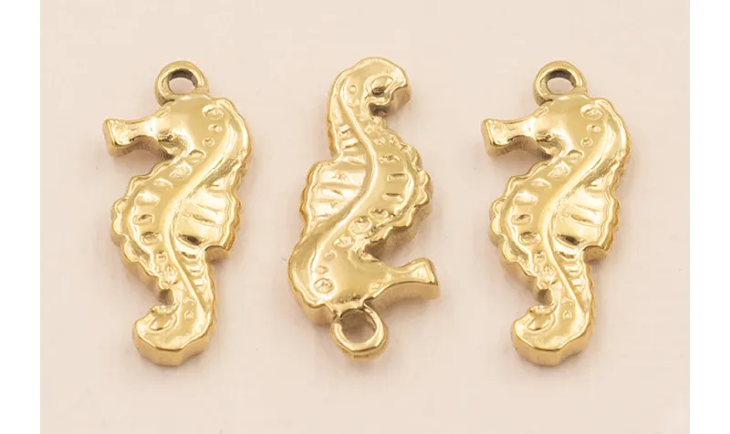 Cogante Caballo Mar Acero Inox. 19*9mm Oro / Cuentas Metálicas de Acero Inoxidable