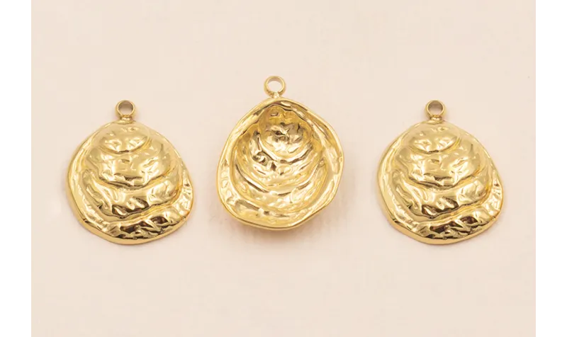 Colgante concha Acero Inox. 15*14mm Oro