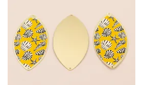 Ovalo 60*33  Oro Mate conchas en fondo Amarillo / Cuentas Metálicas de Latón / Zamak