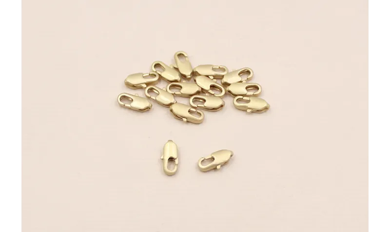 Mini mosquetón 8mm longitud Oro Mate