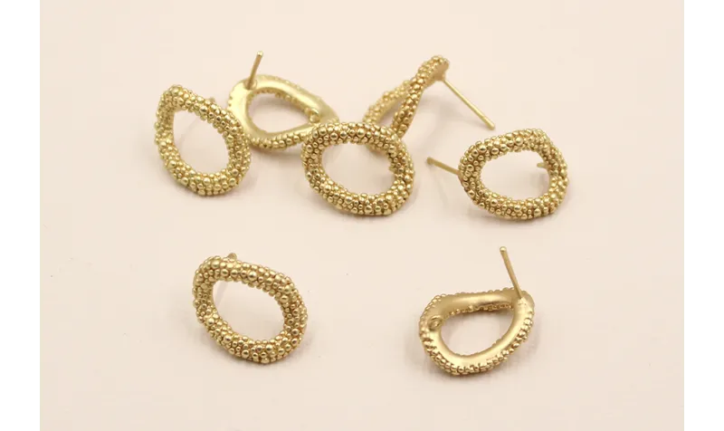 Pendiente Aro pata Pulpo 18*14mm Dorado Mate