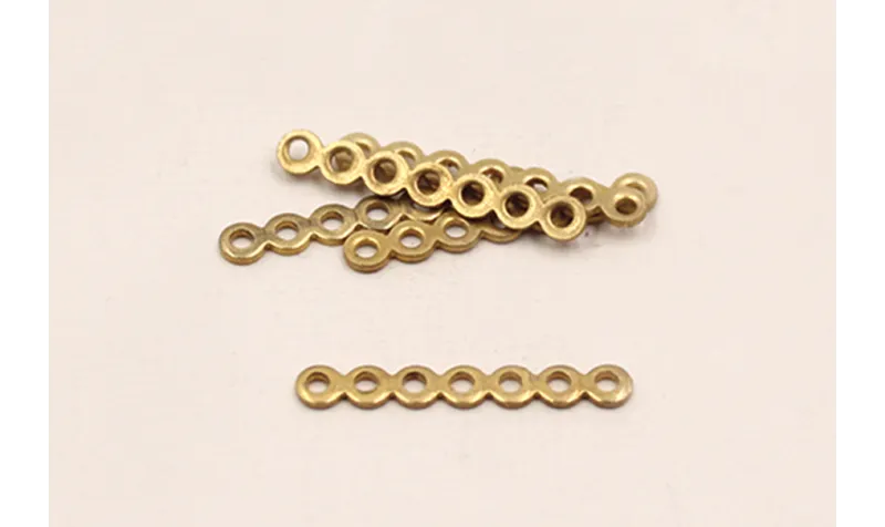 Separador plano 9 agujeros 23mm Oro.  fse139-1