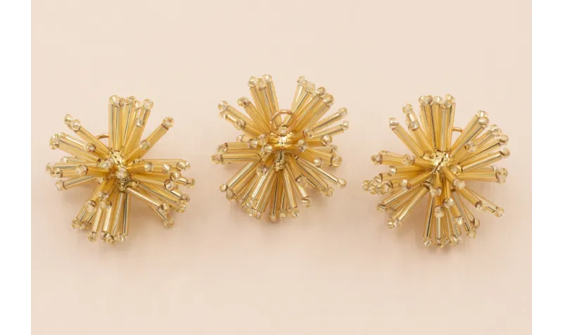 Estrella de Abalorio Dorado de 30mm diámetro Estrella de Abalorio Dorado de 30mm diámetro