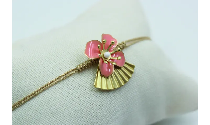 Pulsera nudo serpiente flor esmaltada rosa y trian