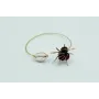 Pulsera rigida fina con esmaltes granates y concha