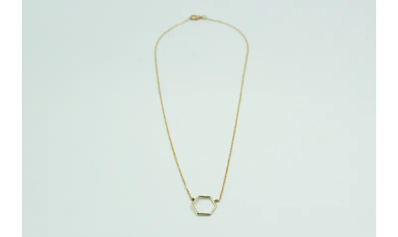 Solitario con hexágono en latón y cadena de eslabó