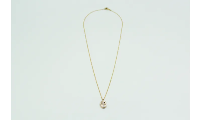 Solitario chapa con cruz de brillos en latón y cad