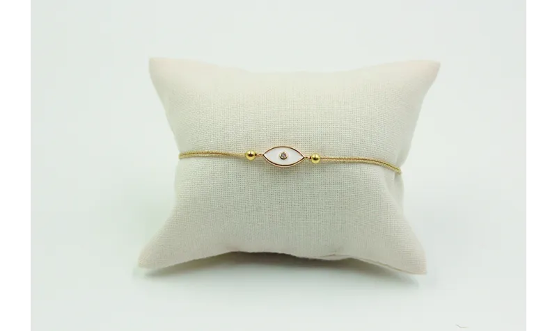 Pulsera de macrame en color oro palido y ojo turco