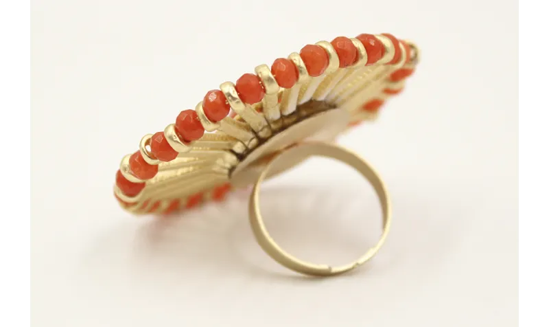 Anillo roseton con facetadas naranjas y listones e