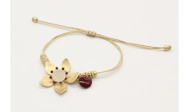 Pulsera hilo macrame oro palido con ruedas estriad