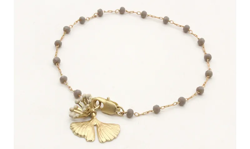 Pulsera cadena de facetadas grises rematada con gi