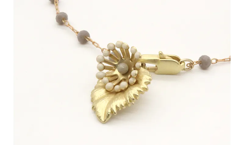 Pulsera cadena de facetadas grises rematada con ho