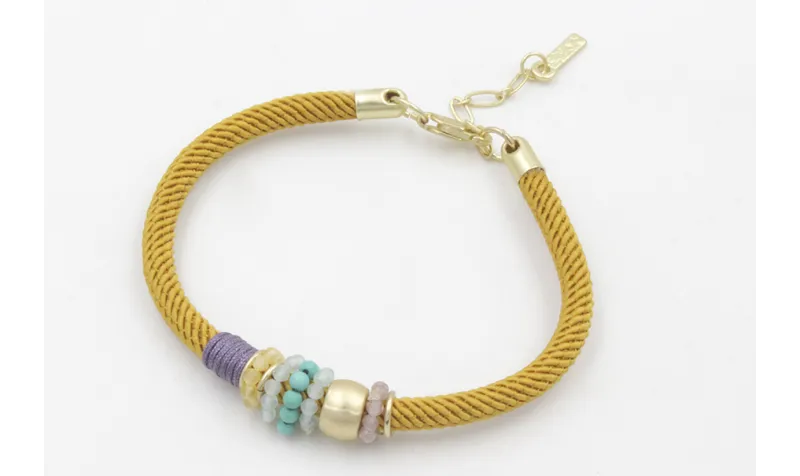 Pulsera de cordón trenzado retorcido color marrón 