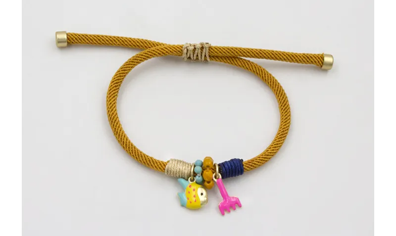 Pulsera cordón retorcido mostaza forrada con hilo 