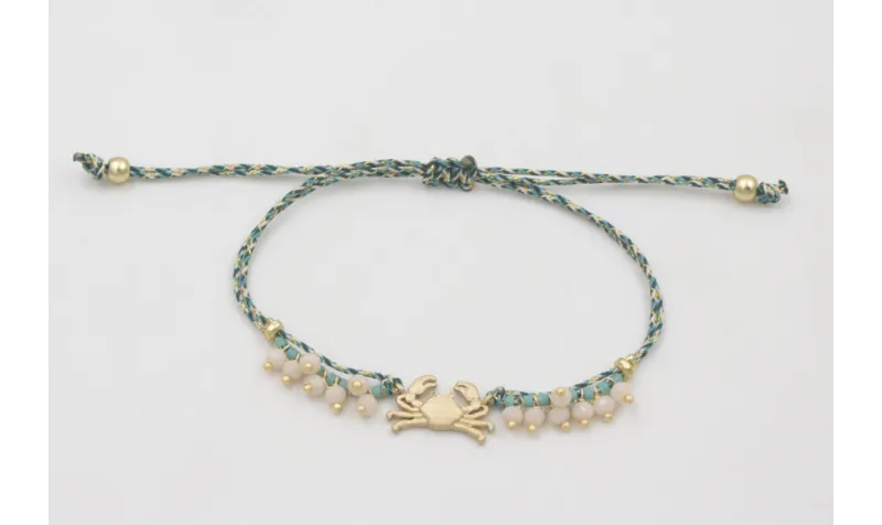 Pulsera micro driza azul, gris y oro con cangrejo 