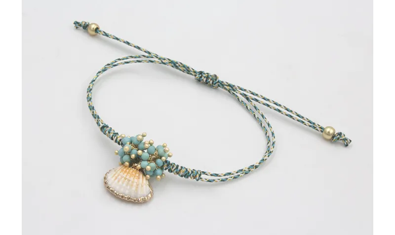 Pulsera micro driza azul, gris y oro con concha bo