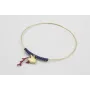 Pulsera rigida dorada brillo con nudo macramé azul