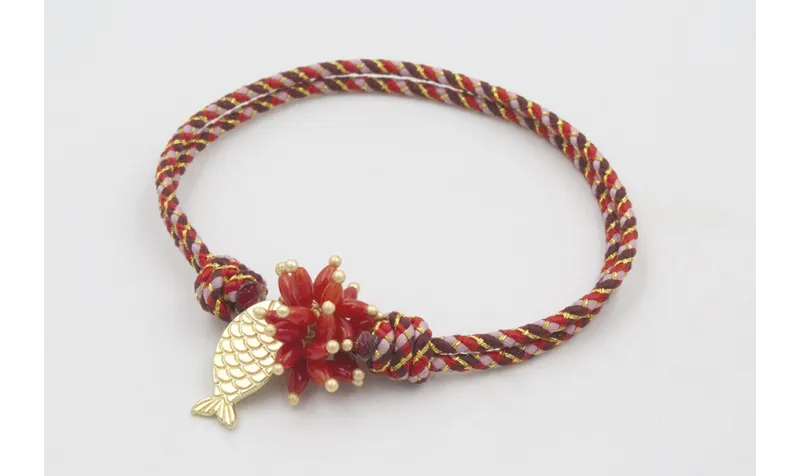 Pulsera nudo corredizo de driza rojiza y rosa con 