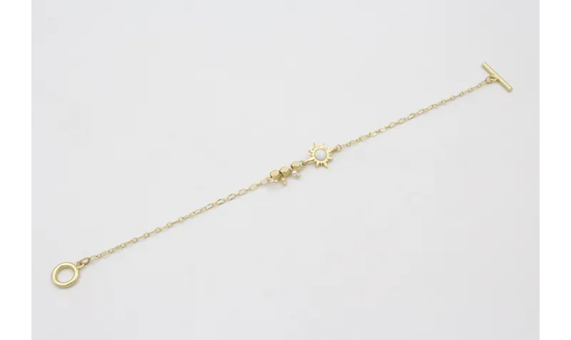 Pulsera cadena eslabón ovalado con entrepieza sol 