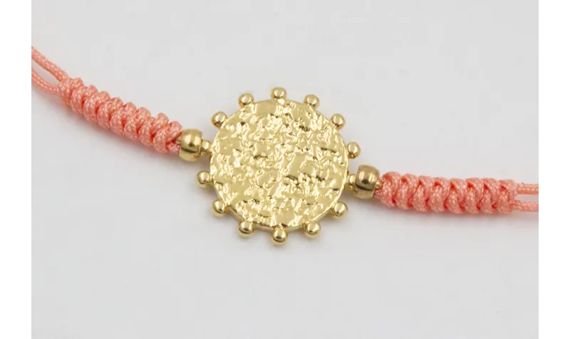 Pulsera  ORO18k-3 micras hilo salmón con nudo serp