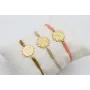 Pulsera  ORO18k-3 micras hilo salmón con nudo serp