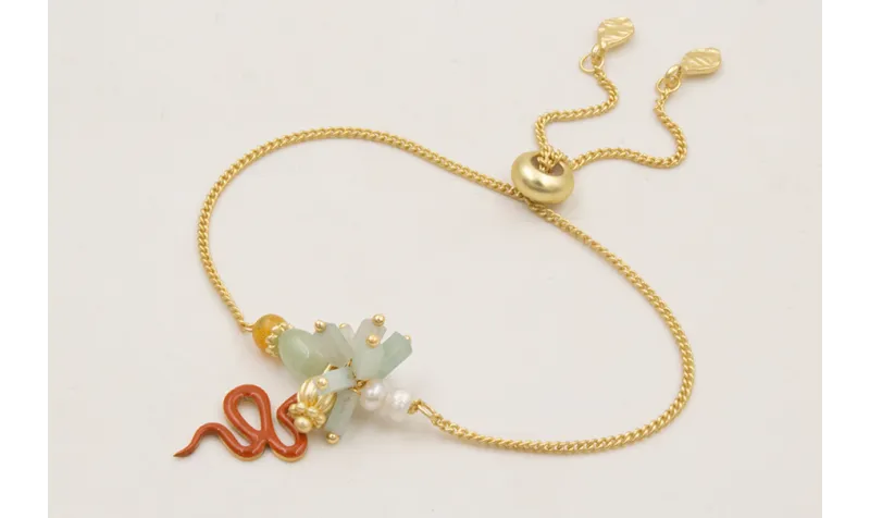 Pulsera cadena eslabón plano con centro de burruño