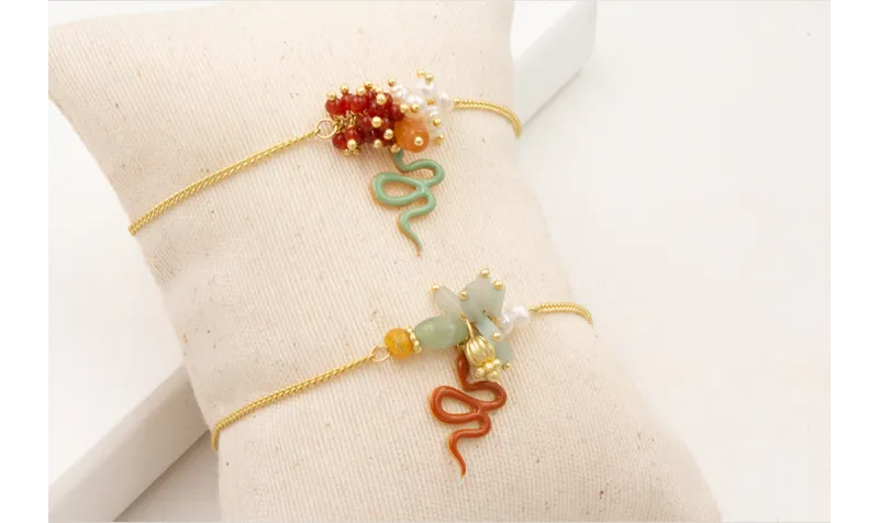 Pulsera cadena eslabón plano con centro de burruño