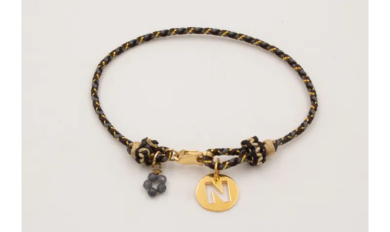 Pulsera driza negra,dorada,gris con nudo falso mac