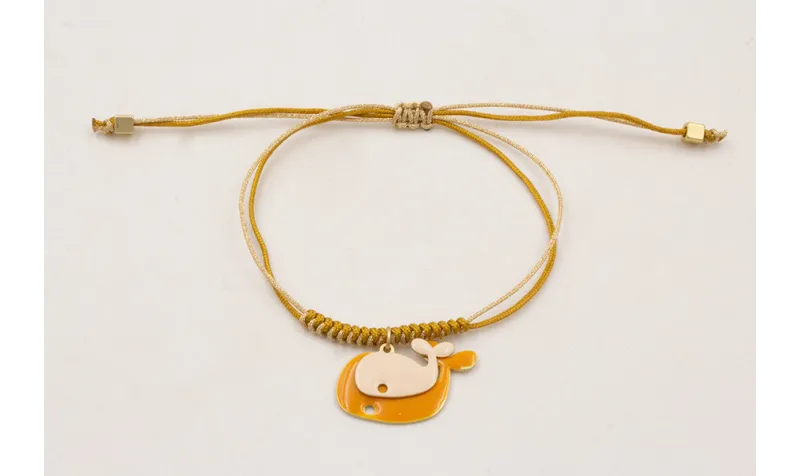 Pulsera nudo de macrame mostaza y dorado palido co