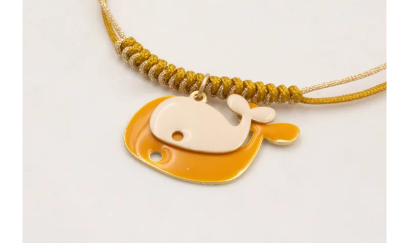 Pulsera nudo de macrame mostaza y dorado palido co