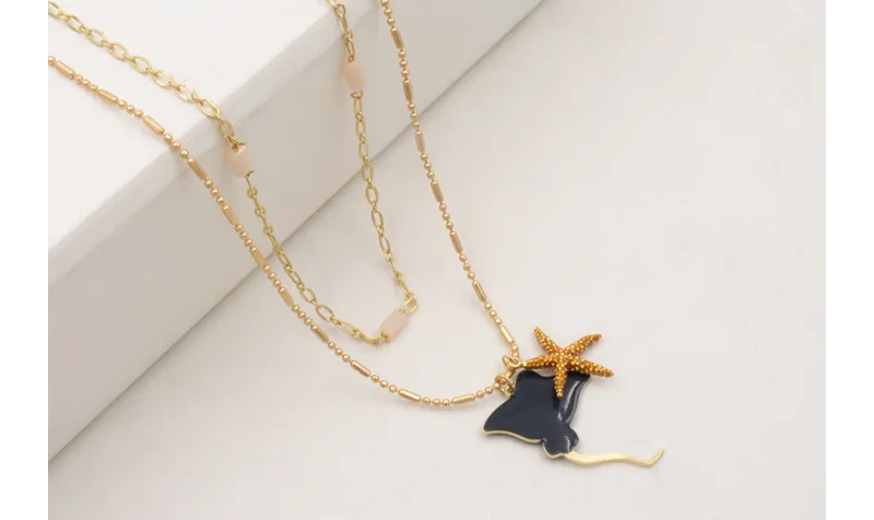 Collar doble con manta raya azul oscuro y estrella