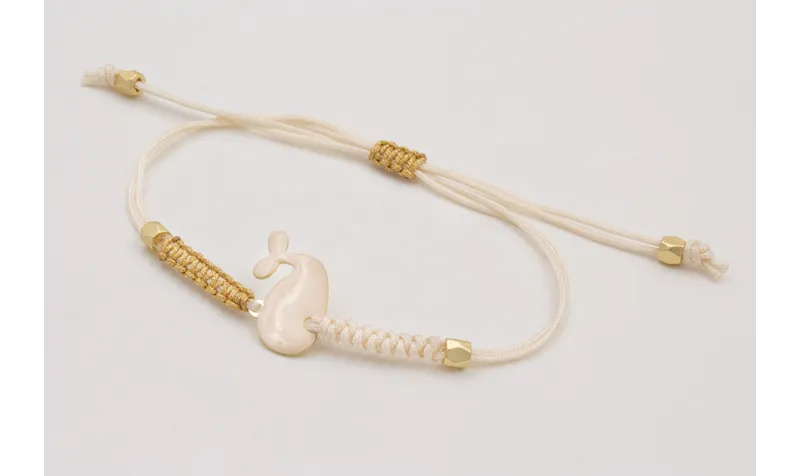 Pulsera nudo serpiente beige,nudo de macrame dorad