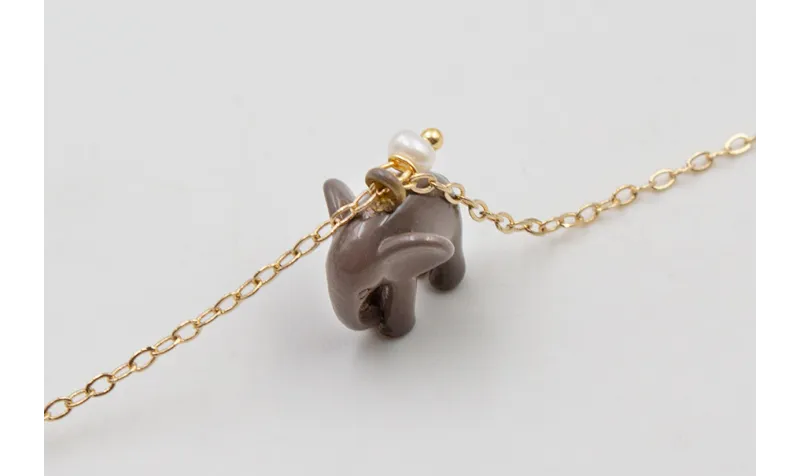 Pulsera cadena eslabón pequeño dorado con colgante