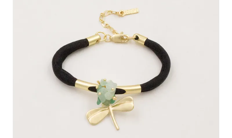 Pulsera seda natural rellena negra con tubo arquea