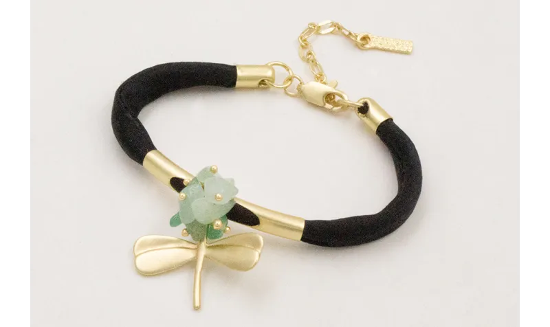 Pulsera seda natural rellena negra con tubo arquea