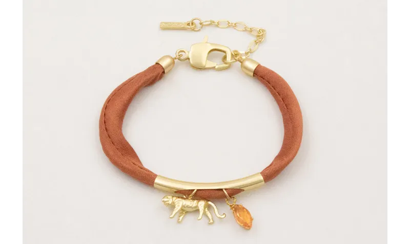 Pulsera seda natural rellena cobriza con tubo arqu