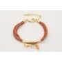 Pulsera seda natural rellena cobriza con tubo arqu