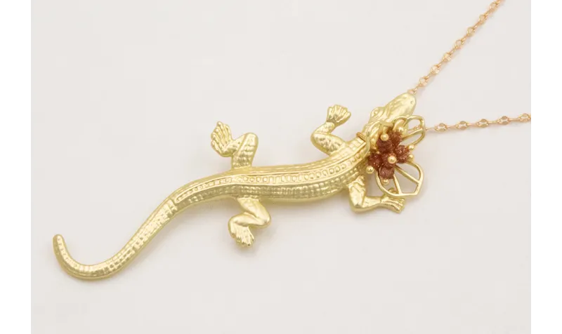 Colitrio cadena micro ovalo dorado mate con colgan