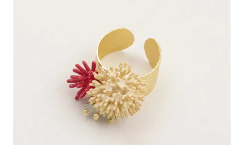 Anillo con estrella coral frambuesa, burruño bolit