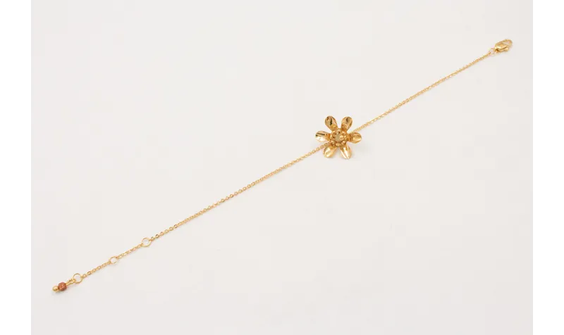 Pulsera ORO 18K. Cadena eslabón pequeño con flor y