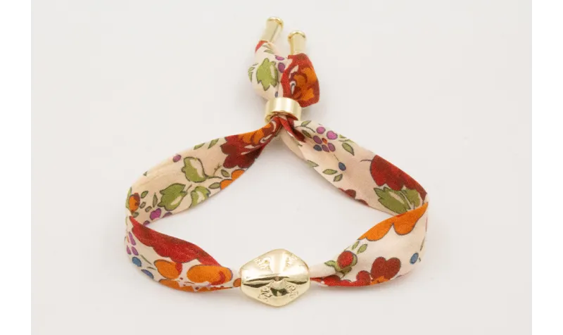 Pulsera lazo estampado bies flores beige y rojas c