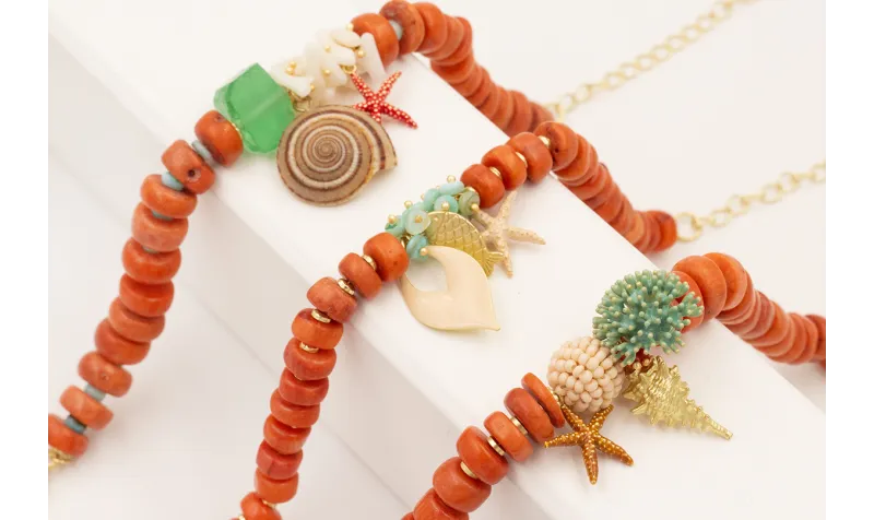 Pulsera discos coral con burruño discos nacar turq